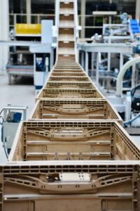 Boxes moving down a conveyor belt in a warehouse