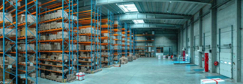 A wide angle photo showing the interior of a warehouse