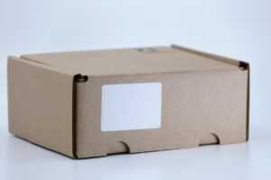 Cardboard box with white label sticker